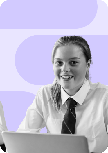 High school student in uniform smiling while working on a laptop, on a purple geometric background. High school student in uniform smiling while working on a laptop, on a purple geometric background.